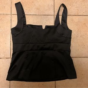 Size 8 black and white market corset like top with side zipper. Feels like silk.